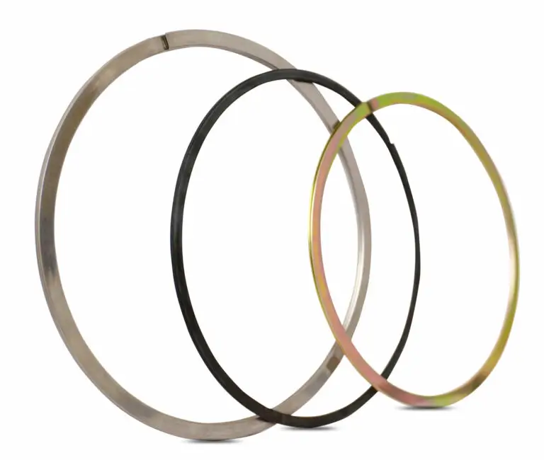 Three Fey laminar sealing rings of different sizes on a white background.