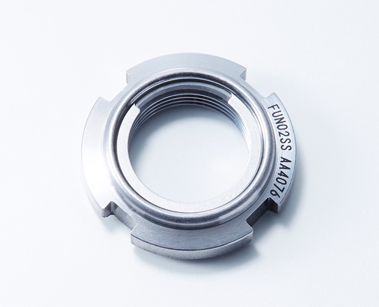 Fine U Nut ball‑bearing locknut with reusable friction‑ring design.