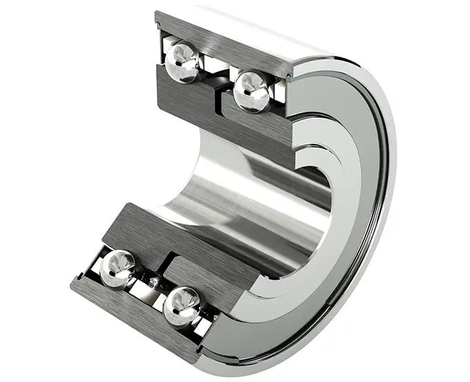 Cutaway of a duplex ball bearing assembly highlighting matched bearing pairs and internal components